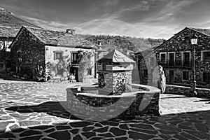 Old village with stone houses in the center of Guadalajara, Spain, black and white photo