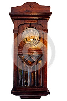 Old vintage antique carved wooden retro clock on white background