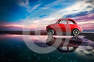 Old vintage antique italian car in amazing sea landscape nature