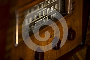 Old, vintage antique 1930`s stand-up radio with knobs and dials photo