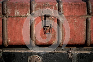 Old vintage antique suitcases trunks in a stack background