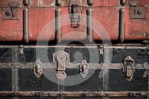 Old vintage antique suitcases trunks in a stack background