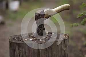 Old vintage axe for chopping wood and stumps