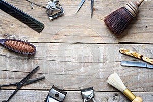 Old vintage barbershop tools on wooden table