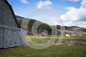 Old Vintage Barns in a Valley on a Sunny Day