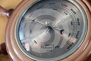 An Old vintage barometer on the wall