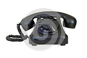 Old vintage black telephone, isolated on white background