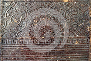 Old vintage book cover texture.Close-up ornament
