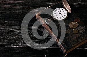 Old vintage books and a old vintage antique pocket watch