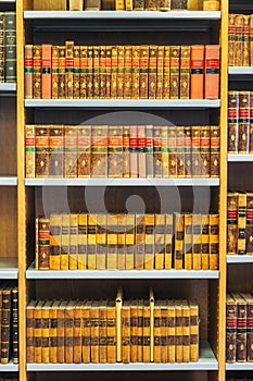 Old Vintage Books On Wooden Shelfs In Library