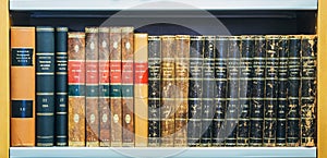 Old Vintage Books On Wooden Shelfs In Library