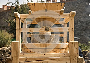 Old vintage bread grind wooden tool on reconstruction medieval festival