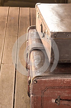 Old vintage brown leather suitcase closeup vertical photo travel design