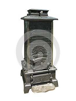 Old vintage burning heater cast iron stove isolated on white background