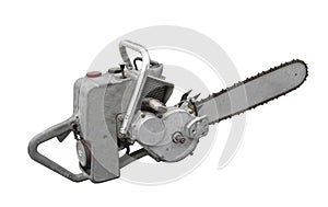 Old vintage chainsaw isolated.