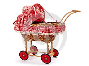 An old vintage childrens doll stroller