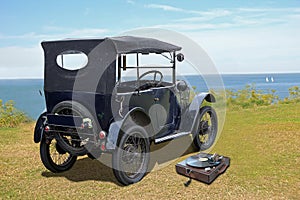 Old vintage classic car ford with phonogram record player