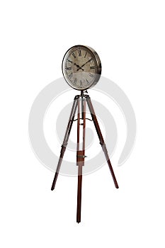 Old vintage clock on a tripod