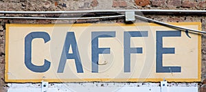 Old vintage coffee sign in Italy - Concept of retro, traditional CaffÃ¨ design