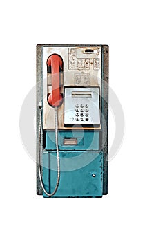 Old vintage coin operated public payphone isolated