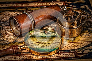 Old vintage compass on ancient map photo