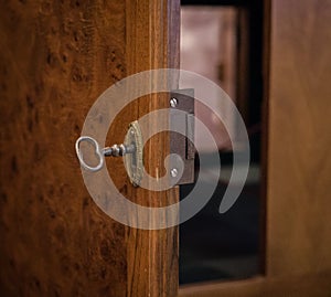 The old and vintage cupboard door with lock