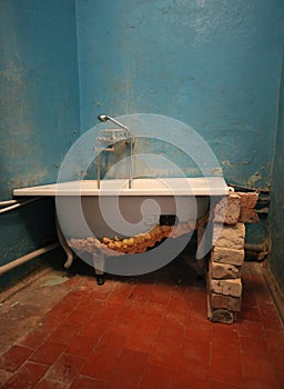 Old vintage dirty broken bathroom. Trash repairs. Grunge background