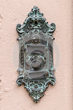 Old vintage door bell with name plate