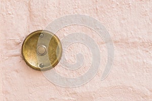 Old vintage door bell with wall background