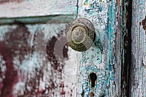 Old vintage door handles. Rusty metal locks and latches.