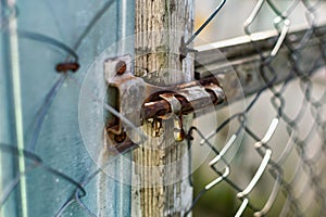 Old vintage door handles. Rusty metal locks and latches.