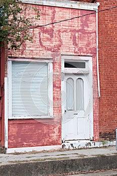 Old vintage downtown brick building front door