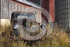 Old Vintage Farm Truck by Barn photo