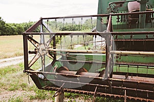 Old vintage farming agricultural harvester