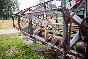 Old vintage farming agricultural harvester