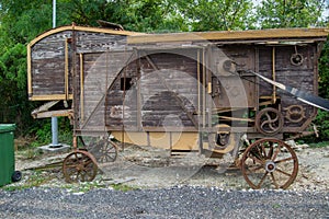 old vintage grain thresher summer day