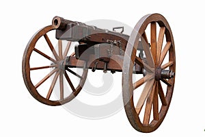 Old vintage gunpowder cannon on wooden carriage with large wheels isolated