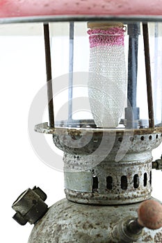 Old or vintage hurricane lamp on white background, Material corrosion of lamp material