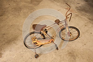 Old vintage kid bicycle.