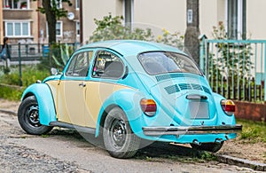 Old vintage light blue VW Beetle 1300 ccm parked