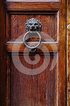 Old vintage lion head door knocker.