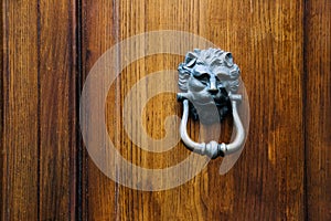 Old vintage lion head door knocker.