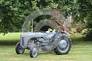 An old vintage little grey fergie ferguson tractor farm equipment