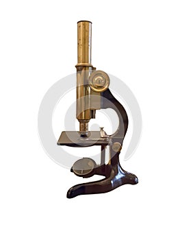 Old vintage microscope isolated over white