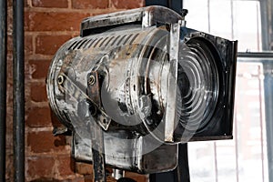 an old vintage movie projector. Lighting and interior decoration in the loft style