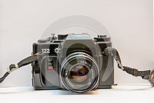 Old vintage photo camera on 35mm film