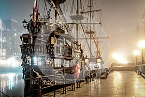 Vintage pirate ship in the mist