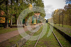 Old vintage railway station with train in Poland, Bialowieza,