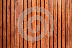 Old vintage red brown wood lath wall cladding for background photo