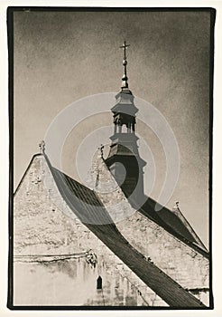 Old vintage paper photo lith print of church in Dobrowoda in southern Poland